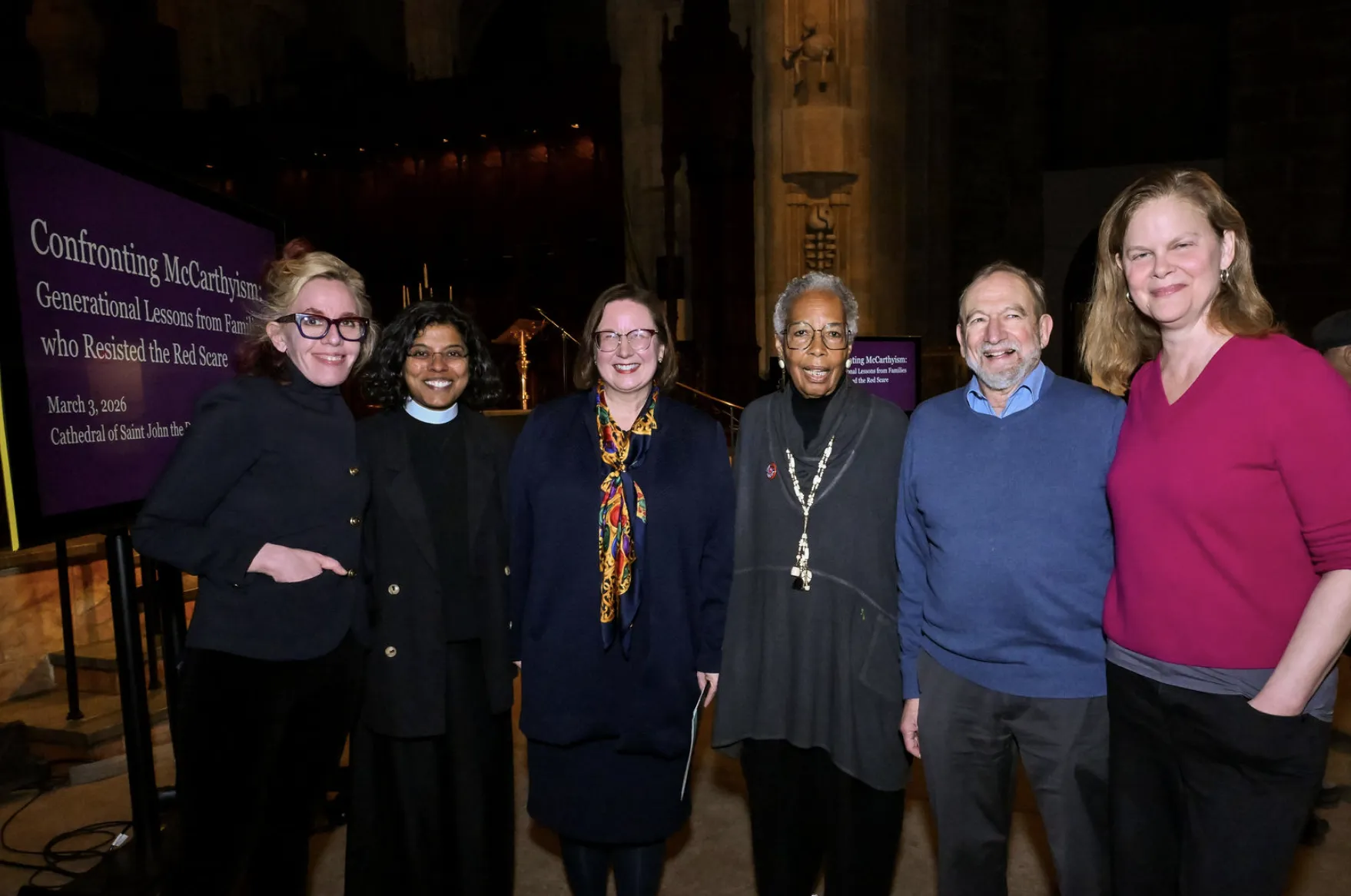 Panelists and discussant pose for a photo